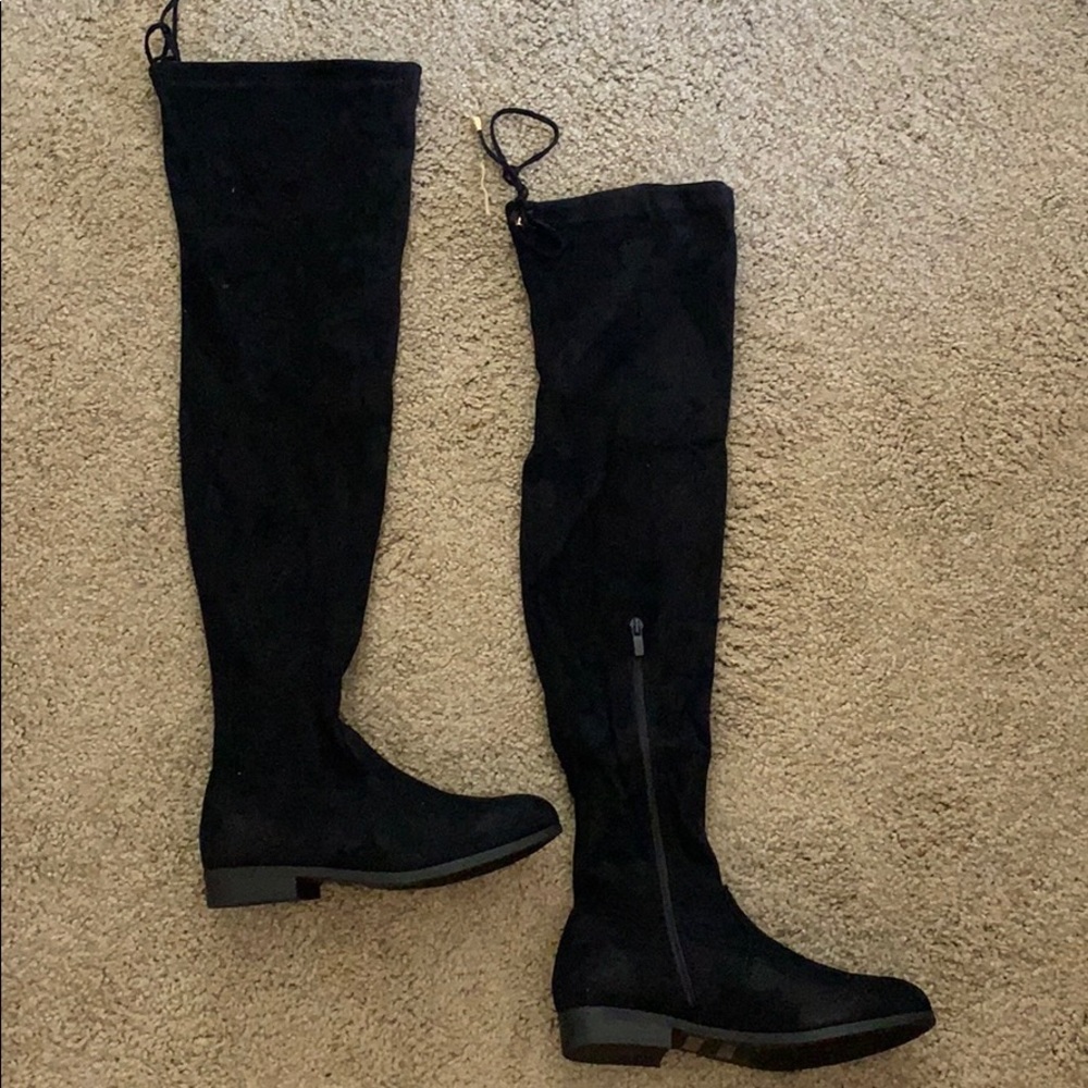 Thigh high black boots